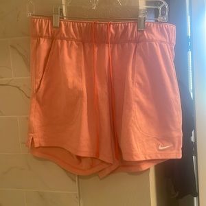 Light red Nike shorts